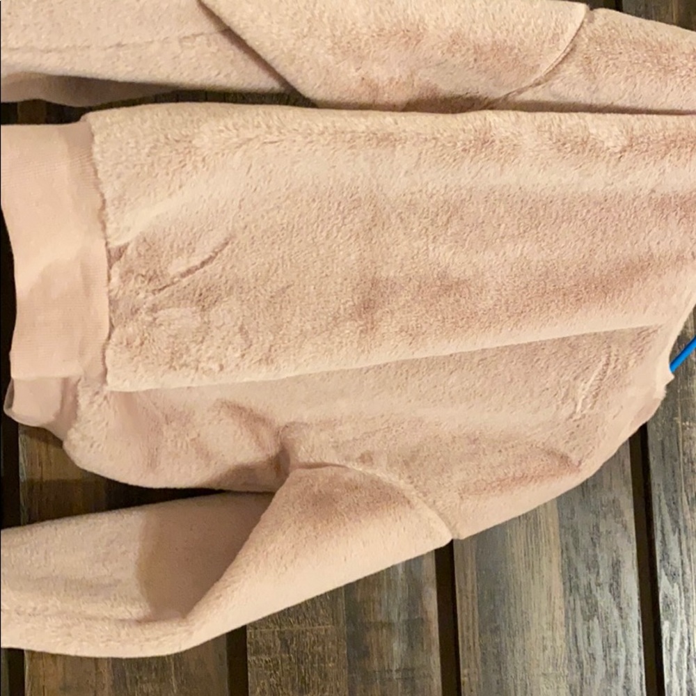 Furry pink sweater never been worn !!!